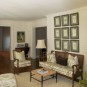 Wonderful White Mountain House Designed in Modern Building Style: Awesome Living Room Interior Design In Mountain Brook Road House With Traditional Vintage Furniture Combined With Artistic Wall Decor