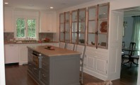 Wonderful White Mountain House Designed in Modern Building Style: Powerful Kitchen Island With Seating Design In Mountain Brook Road Home Interior With Traditional Finishing Used Wooden Material For Inspiration