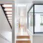 Wonderful Contemporary Home Idea with Amazing Color Choice: Fantastic Interior Living Space Design In Hallway Decorated With Wooden Flooring And White Wall Design Ideas For Home Inspiration